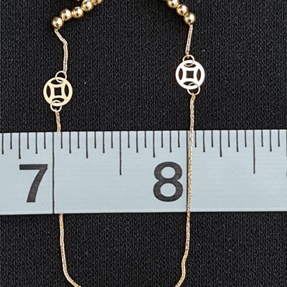 18k Bracelet with small balls and cute money catcher design as charm - Picture 11 of 16